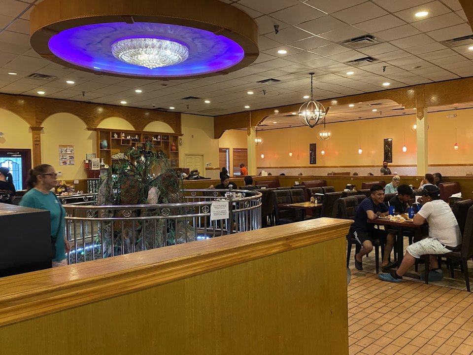 Asian buffet counters with assorted dishes