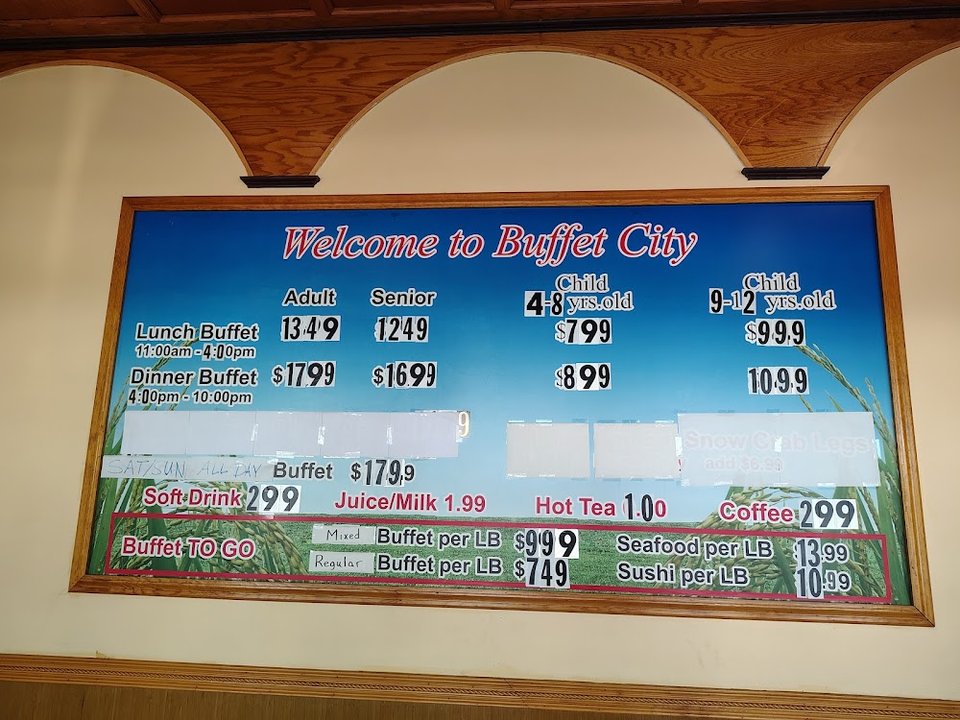Buffet dishes including sushi and American fare