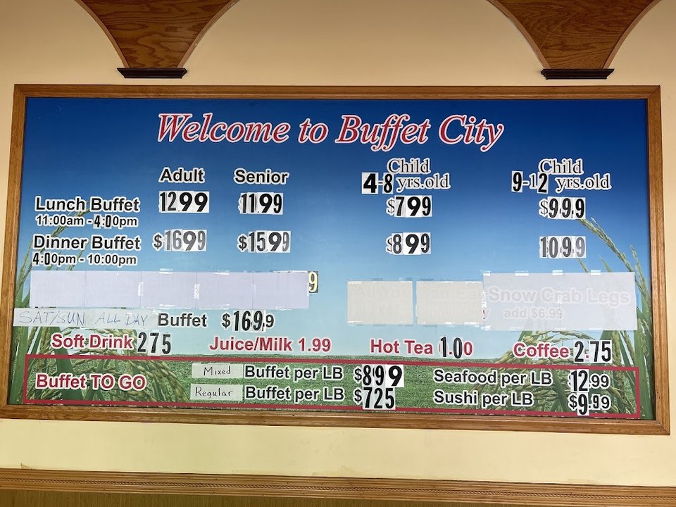 Menu-style food display with lo mein and shrimp